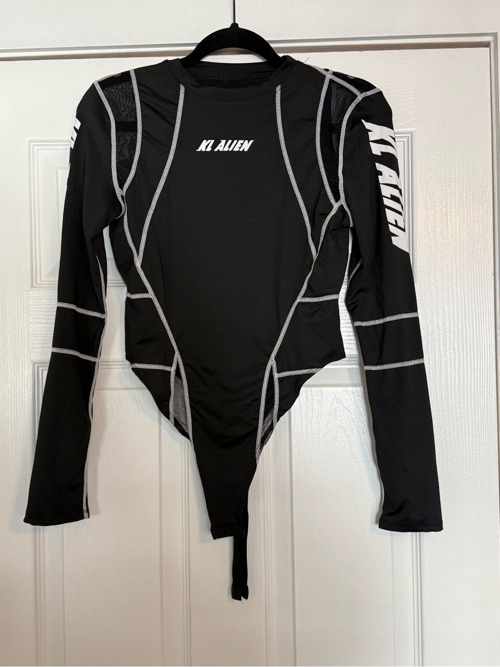 Studio Black Long-Sleeve Bodysuit with Contrast Stitching